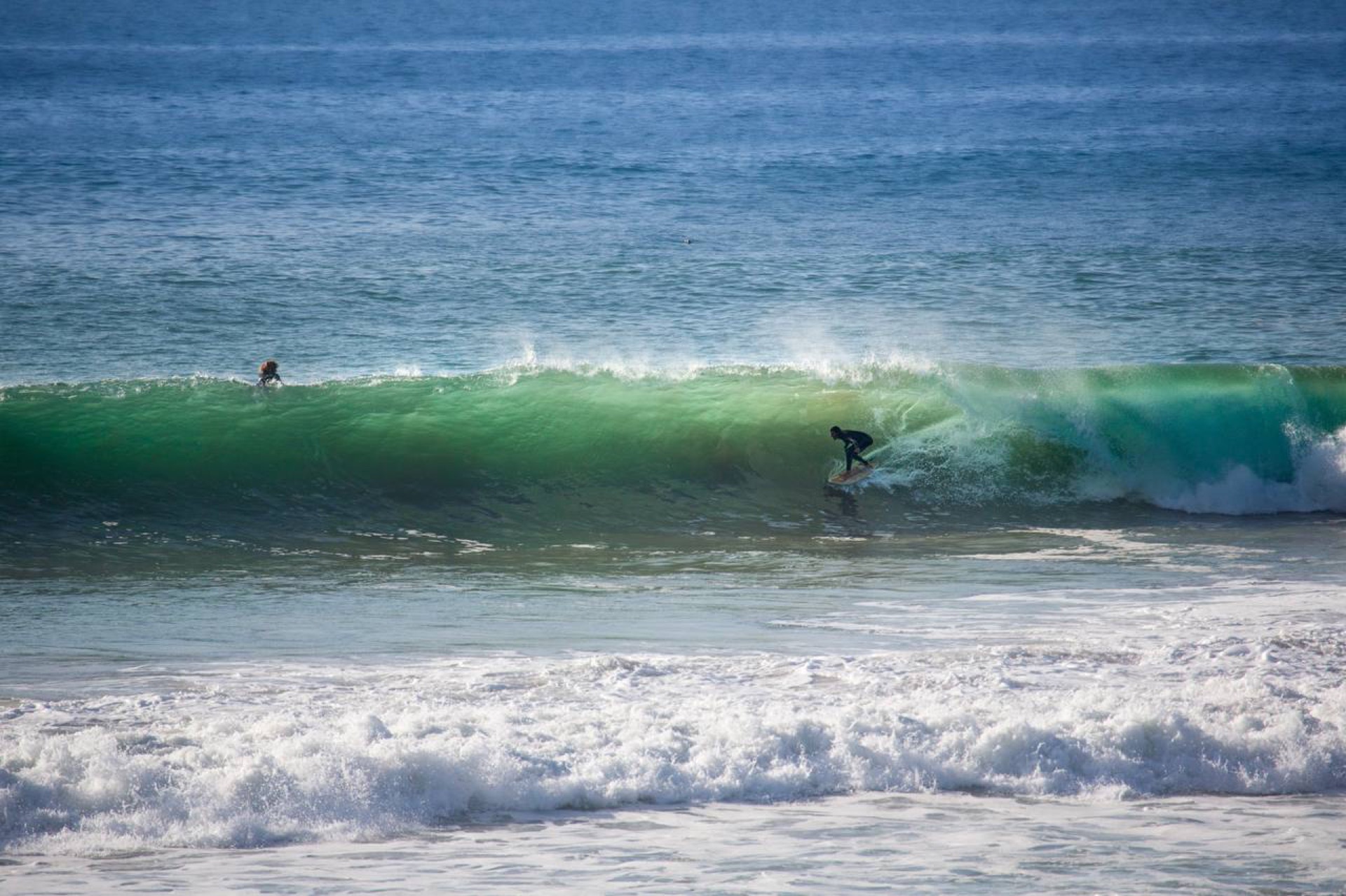 Surfer threading a section at Spiders in Aourir